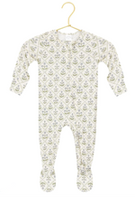 Lou Lou & Company’s Baby Girls’ Etta Zipper Footie is a cozy, long-sleeved onesie with a green and gray leafy pattern, shown on a gold hanger against a white background. Crafted from silky-soft fabric, it features convenient zipper footies for easy changes.