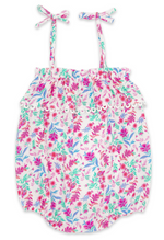 The Feather 4 Arrow Baby Girls’ Bonita Romper is an infant bubble romper with a pink, green, and blue floral print, delicate crochet ruffle trim, and adjustable shoulder straps, shown on a white background.