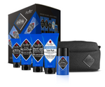 Introducing The Jetsetter by Jack Black: a men’s grooming kit featuring five blue-and-black skincare essentials—including Beard Lube Conditioning Shave and Face Moisturizer SPF 20—packaged with a dark gray toiletry bag. Designed for on-the-go maintenance, this Travel Grooming Kit keeps your routine streamlined wherever you are. The background packaging is labeled “Jetsetter.”.