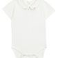 The Tartine et Chocolat Baby Boys’ Pointed Collar Onesie is a white ecru short-sleeve bodysuit featuring an elegant pointed collar with delicate small animal embroidery, along with snap closures at the bottom.