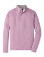 The Peter Millar Stealth Performance Quarter-Zip is a light purple long-sleeve pullover featuring a stand collar, simple design, four-way stretch fabric, and visible stitching details, shown on a white background.