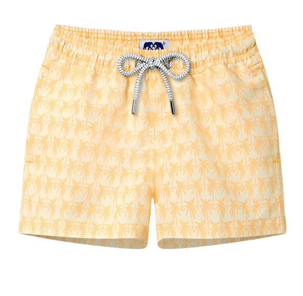 Love Brand Kids Staniel Swim Trunks in yellow feature a vibrant palm tree pattern and a drawstring waist. Made from recycled polyester for eco-friendly fashion, these quick-dry shorts offer style and comfort for boys at the beach or pool.