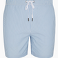 The Charles 5" Swim Trunk by Onia features light blue and white vertical stripes, classic tailoring, a white drawstring with metal tips at the waistband, and quick-dry fabric.