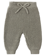 Taupe Baby and Kids’ Chucky Knit Pant in a waffle-textured, relaxed-fit knit with an elasticated waistband and decorative drawstring bow.