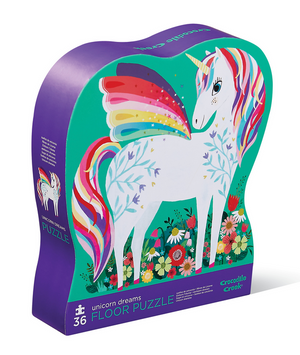 A vibrant box with a unicorn image holds Crocodile Creek's "Unicorn Dreams Puzzle"—a 36-piece floor puzzle featuring large pieces ideal for young children.