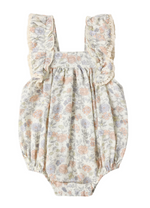 The Baby Girls' Maya Romper by Rylee & Cru is a vintage-inspired summer piece with pastel floral prints, ruffled shoulder straps, and bottom snap closures.