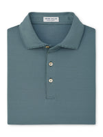 Peter Millar Jubilee Performance Jersey Polo in blue with fine horizontal stripes, a three-button placket, and four-way stretch for summer comfort.