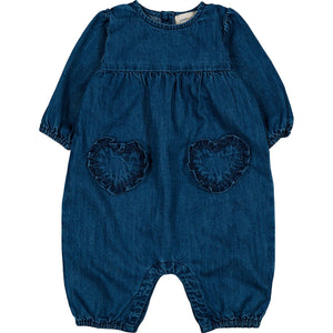 The Louis Louise Baby Girls' Tournesol Light Denim Overall features long sleeves, elastic cuffs, and two adorable heart-shaped front pockets.