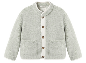 The Rylee & Cru Baby Girls’ and Girls’ Chalet Jacket in light gray features long sleeves, cozy front pockets, a quilted button placket, and white trim along the edges.