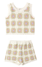 The Rylee & Cru Girls' Crochet Tank Set features a sleeveless crop top and matching shorts with square motif patterns in pastel hues and ruffled trim, displayed on a white background.