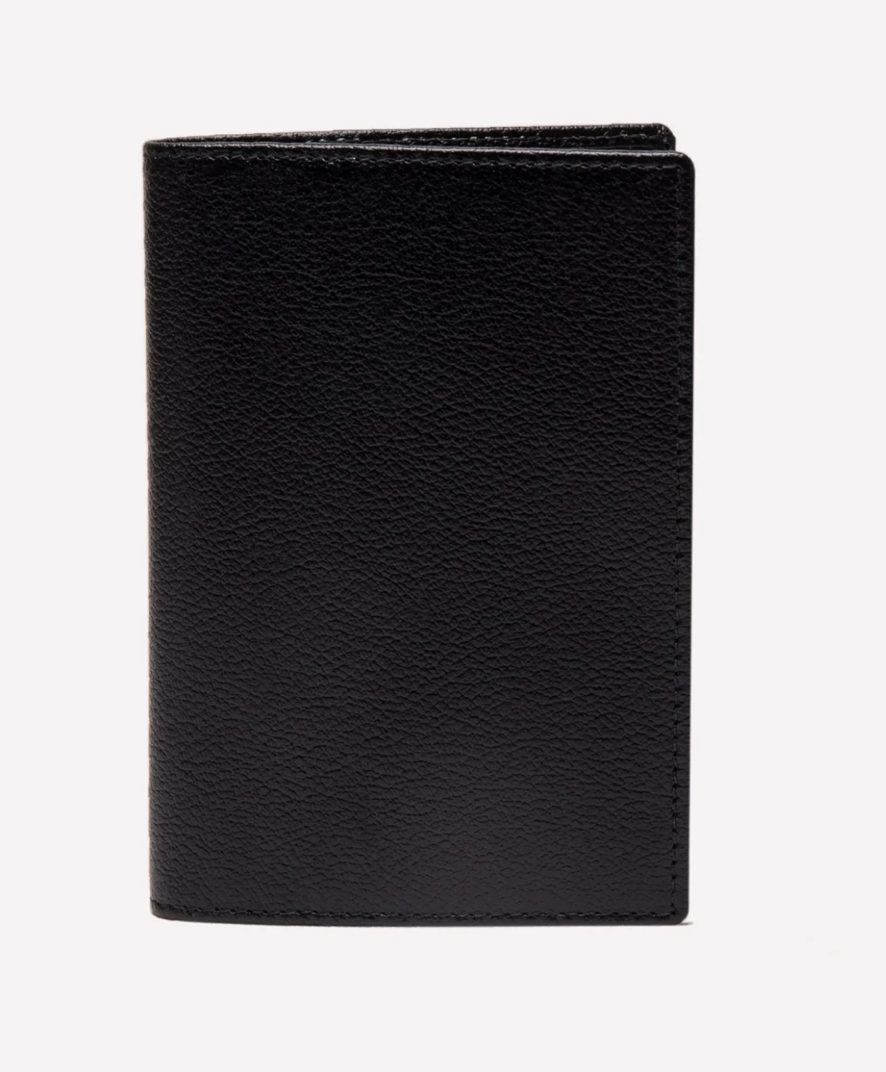 The Ettinger Capra Passport Case in black Capra leather is shown standing upright against a plain white background.