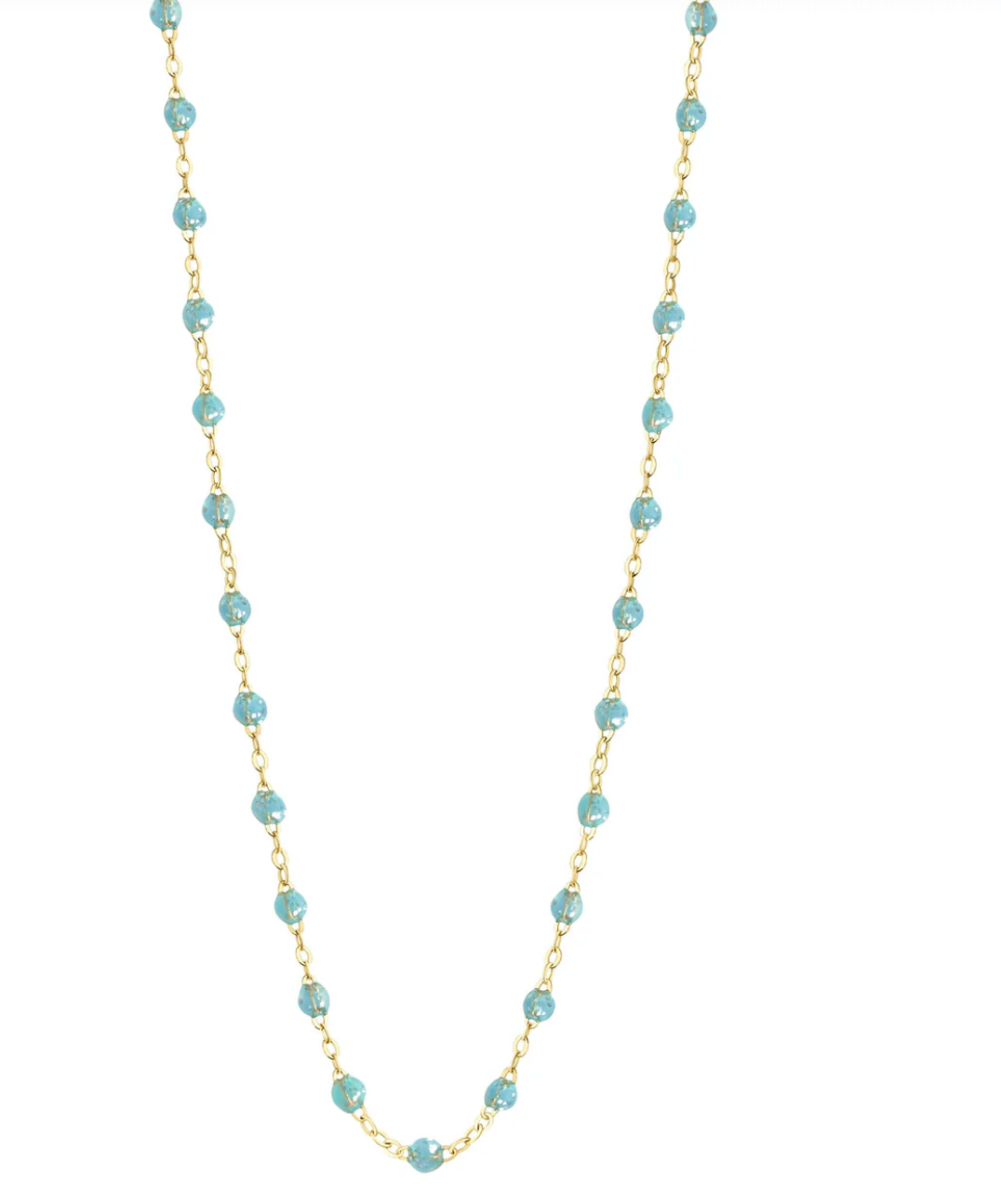 The Gigi Clozeau Classic Gigi Necklace 19.7", fashioned in 18-carat yellow gold, showcases a fine gold chain accented by small turquoise beads evenly distributed along its length, capturing the timeless elegance associated with Gigi Clozeau.