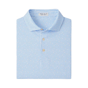 The Peter Millar Alta Performance Jersey Polo is a light blue patterned shirt with a collar, two beige buttons, a small inside label, and UPF 50+ protection for all-day comfort.