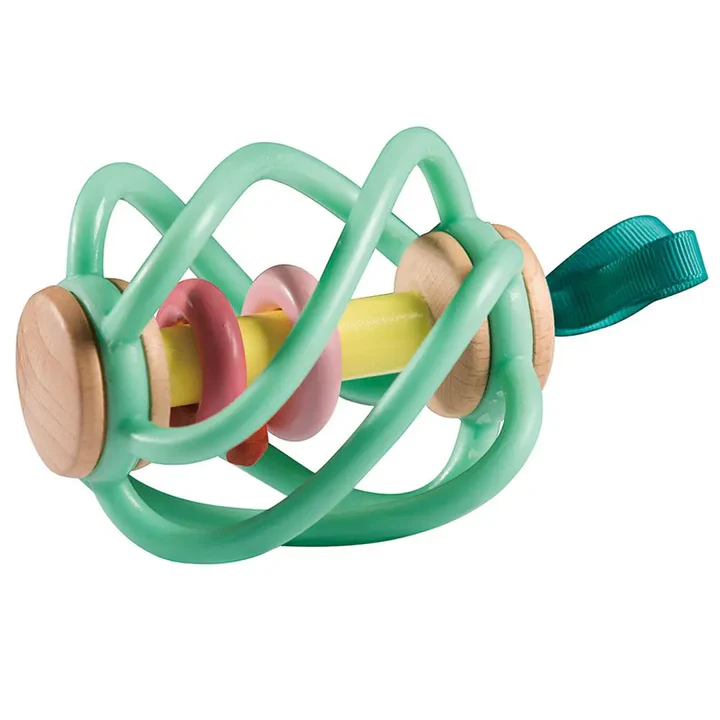 The Hape Apple Grab Toy is a green and yellow baby rattle with wooden ends, pink rings, and a teal ribbon loop—a charming teether perfect for strollers.