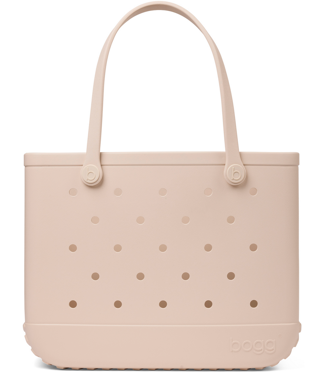 Beige rubber Original Bogg® Bag tote featuring two handles, a rectangular silhouette, and small evenly spaced holes on the front and sides. The Bogg Bags brand name is embossed near the bottom edge, making this tote a durable and conveniently washable beach bag.