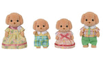 Four Calico Critters Toy Poodle Family figurines—two adults and two children—stand in a row against a white background, each wearing colorful, removable fabric outfits.