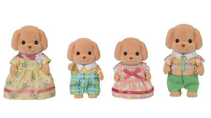 Four Calico Critters Toy Poodle Family figurines—two adults and two children—stand in a row against a white background, each wearing colorful, removable fabric outfits.