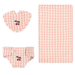 The Konges Slojd Doll Nursery Set by Konges Slojd is a delightful collection of pink and white checkered baby accessories, crafted from 100% cotton. This charming set includes a cherry-adorned bib, a matching diaper cover, and an adorable blanket, making it perfect for any doll nursery setup.