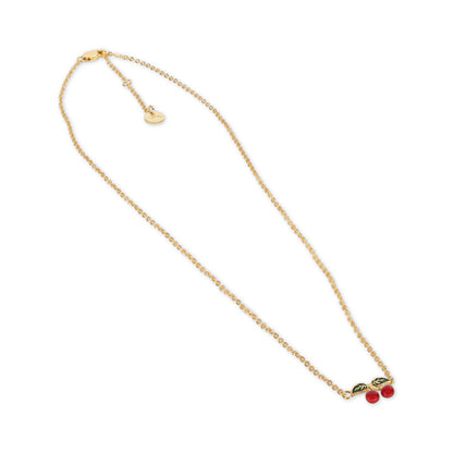 The Konges Slojd 24K Gold Plating Cherry Necklace, featuring a pendant with two red beads and green leaves, is a splendid special occasion gift. It comes elegantly presented in a luxurious velvet box.