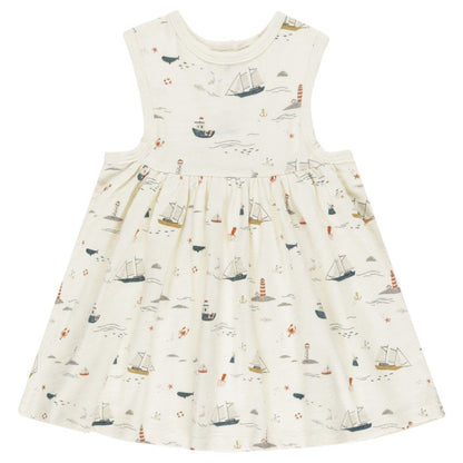The Rylee & Cru Baby Girls' & Girls' Layla Dress is a sleeveless white cotton jersey babydoll, featuring a nautical sailboats, lighthouses, waves, and seagulls print in soft blue, red, and beige tones.