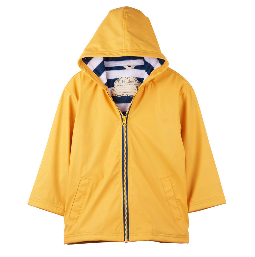 The Hatley Kids’ Yellow Zip Up Splash Jacket, featuring a hood, striped lining, and a PVC-free design, is shown against a white background—perfect for keeping children dry on rainy days.