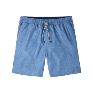 The Peter Millar Island Palms Swim Trunk in light blue features a subtle pattern, quick-drying fabric, a comfortable mesh liner, an elastic waistband, and a small round logo near the left hem, shown against a white background.