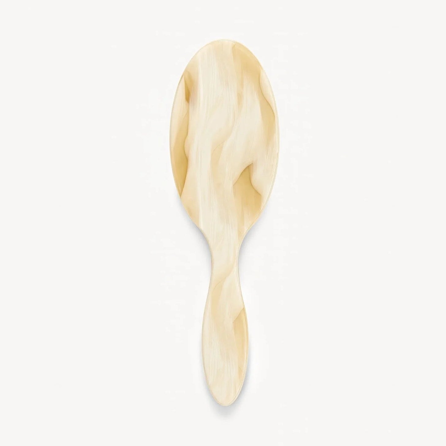 The Machete Petite Travel Hair Brush, featuring a smooth, light-colored wooden finish and gentle detangling bristles, is displayed against a plain white background.