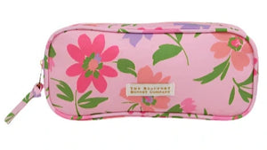 The Beaufort Bonnet Company’s Peyton Pencil Pouch is a rectangular pink pouch with green and red floral patterns, a front fabric label, and zipper, inspired by the lush beauty of Grand Cayman Gardens.