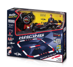 Boxed Maisto R/C 1:41 DC Oracle Red Bull RB2 Formula Racing car set with remote control, featuring Red Bull Racing branding and a driver image; includes race track pieces for assembly.