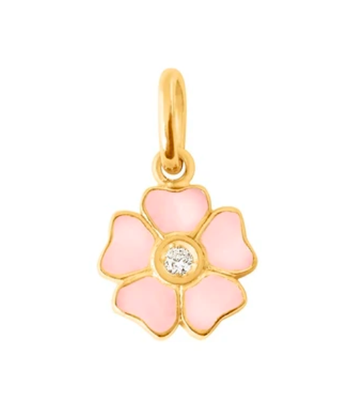 The Gigi Clozeau Flower Pendant Diamond showcases pink enamel petals and a central sparkling diamond, crafted in luxurious 18-carat yellow gold.