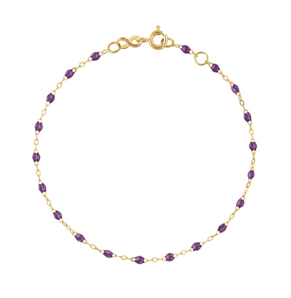 Enhance your style with the Classic Gigi Bracelet 6.7" from Gigi Clozeau, boasting small purple gemstones on an 18-carat yellow gold chain and a secure clasp.