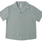 The Rylee & Cru Boys' Lapel Collar Shirt in sea green features a waffle texture, wooden buttons, and is shown laid flat on a white background.