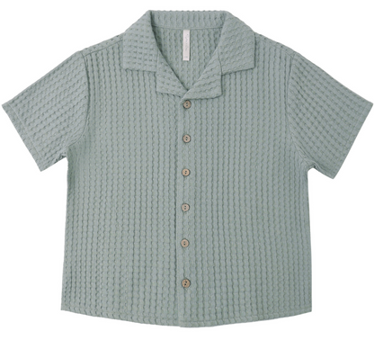The Rylee & Cru Boys' Lapel Collar Shirt in sea green features a waffle texture, wooden buttons, and is shown laid flat on a white background.