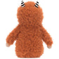 A back view of the Jellycat Pip Monster, a small furry plush toy from Jellycat, featuring gingery fur and two small striped horns on its head.