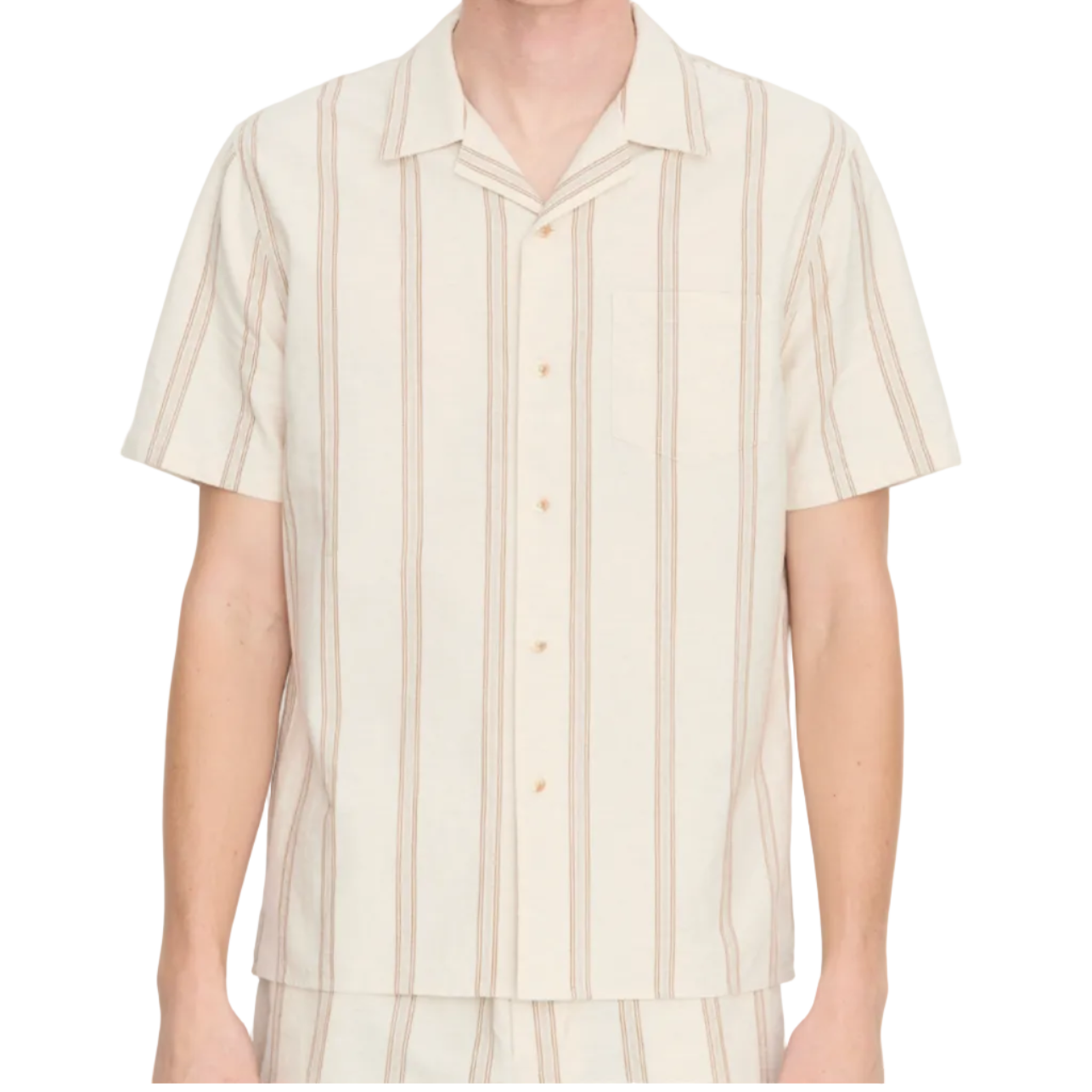 A person wearing the vince Cove Stripe SS Cabana—a short-sleeve, beige cotton-hemp shirt featuring a double-stripe pattern and a chest pocket—shown from the waist up against a white background.