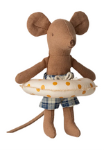Maileg’s Beach Mouse with Yellow Dot Float - Little Brother is a charming stuffed fabric mouse dressed in blue plaid swim trunks and a white inflatable swim ring with yellow dots, making him the perfect companion for sunny beach adventures.