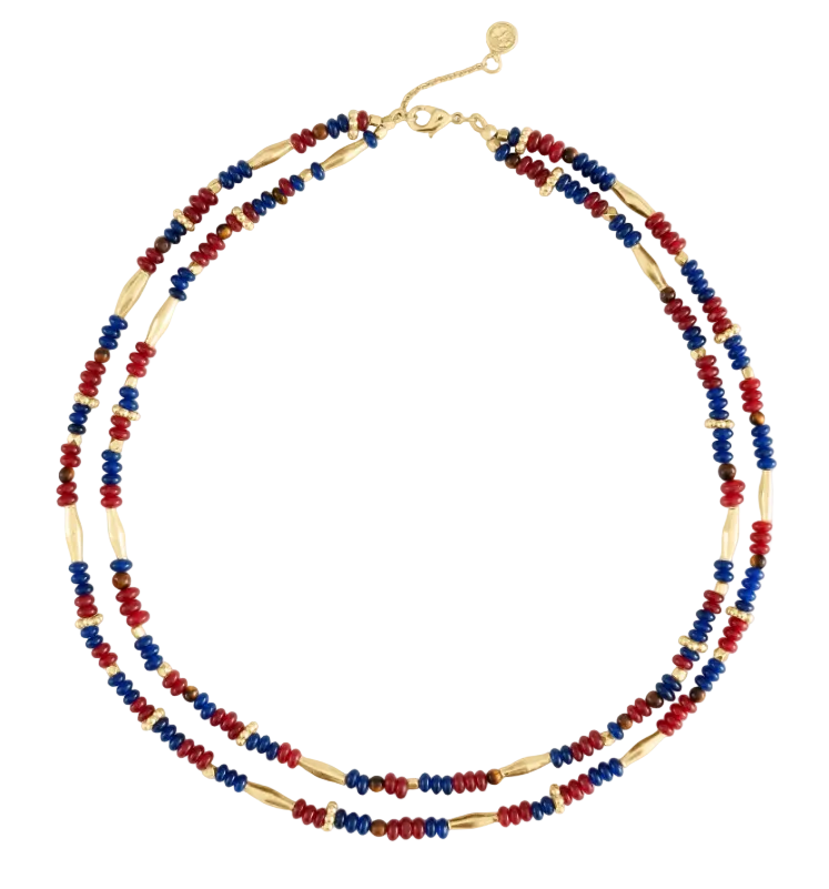 Anabel Aram Milos Beaded Necklace featuring two strands of red, turquoise, and lapis lazuli beads accented with elongated gold-tone metal beads.