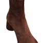 A single Proenza Schouler Glove Suede Boot featuring a stylish block heel against a white background.