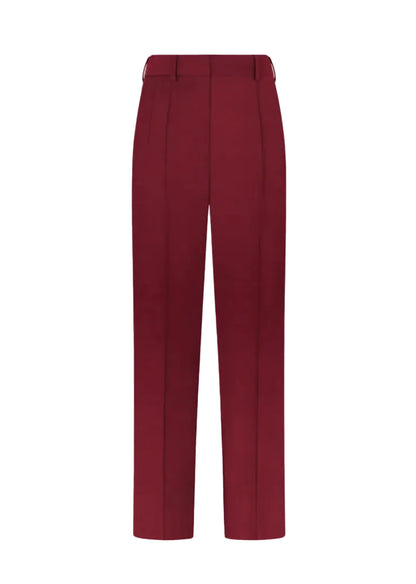 Novalis Fox Pants by Blaze Milano: straight-leg maroon women’s trousers with belt loops and front crease, shown on a white background.