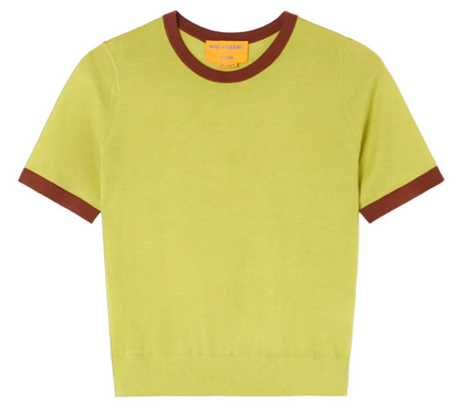 The Airy Ringer Tee by Guest in Residence is a light green, short-sleeve vintage-inspired shirt with brown trim on the collar and sleeves, shown flat on a white background.