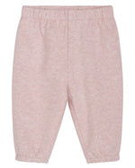 Serendipity Baby Girls’ Sweat Pants in light pink are made from soft organic cotton with an elastic waistband and cuffs. GOTS certified for your peace of mind, these sweat pants are displayed flat against a white background.