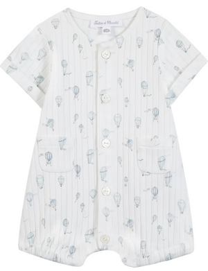 The Tartine et Chocolat Baby Boys’ Hot Air Balloon Short Jumpsuit features soft white cotton, short sleeves, front buttons, two pockets, and a subtle blue hot air balloon print—an ideal everyday newborn outfit that offers both comfort and style.