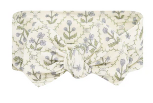 The Lou Lou & Company Baby Girls’ Etta Headband features a charming cream-colored fabric with a large bow adorned in a green and lavender floral pattern—an adorable newborn hair accessory perfect for your little one.