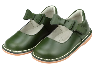 The L'Amour Iris Bow Strap Mary Jane by L'Amour Shoes is a charming pair of green children's shoes featuring brown soles and delightful bow details on the straps, making them perfect for fall gatherings and holiday celebrations.