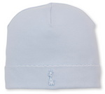 The Baby Giraffe Laughs Hat by Kissy Kissy is a light blue baby hat, crafted from ultra-soft Pima cotton and detailed with a small embroidered giraffe near the bottom edge, finished with a simple scalloped seam above the embroidery.