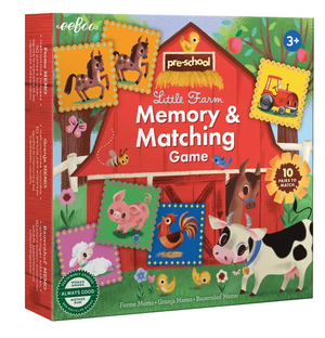 Bright and cheerful box of Eeboo's "Little Farm Pre-School Matching Game" for ages 3+, featuring charming farm animal and tractor illustrations set against a red barn backdrop. This engaging memory game for children includes 10 matching pairs, making it an ideal preschool game that promotes learning and fun.