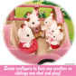 Four Calico Critters figures sit together inside the Calico Critters Family Picnic Van, with seats arranged so they can chat, play, and share their picnic accessories.