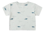 The Quincy Mae Baby and Kids' Boxy Tee is a comfy light grey toddler shirt featuring a cute all-over blue narwhal print.