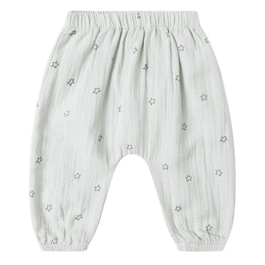 The Quincy Mae Baby Boys' Woven Pant features a light gray fabric, elastic waistband and cuffs, and a subtle pattern of small outlined stars.