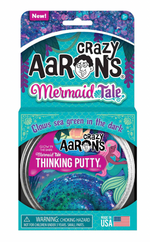 Crazy Aarons Thinking Putty in Mermaid Tale offers blue-green, glow-in-the-dark putty for sensory play, with a mermaid illustration on the label.